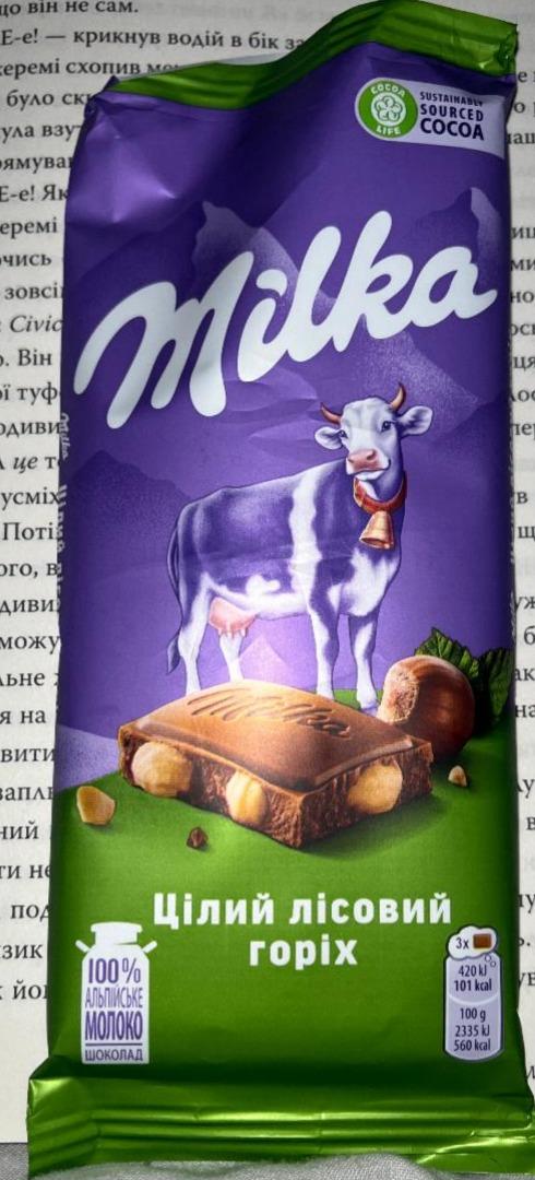 Фото - Шоколад молочний з цілим лісовим горіхом Milka