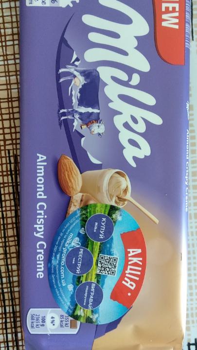 Фото - Шоколад Milka almond crispy Mondelez