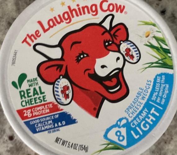 Фото - Light creamy spreadable cheese wedges The laughing cow