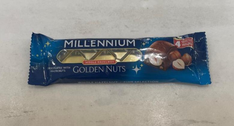 Фото - Цукерки шоколадні з начинкою та цілими горіхами Golden Nut Millennium