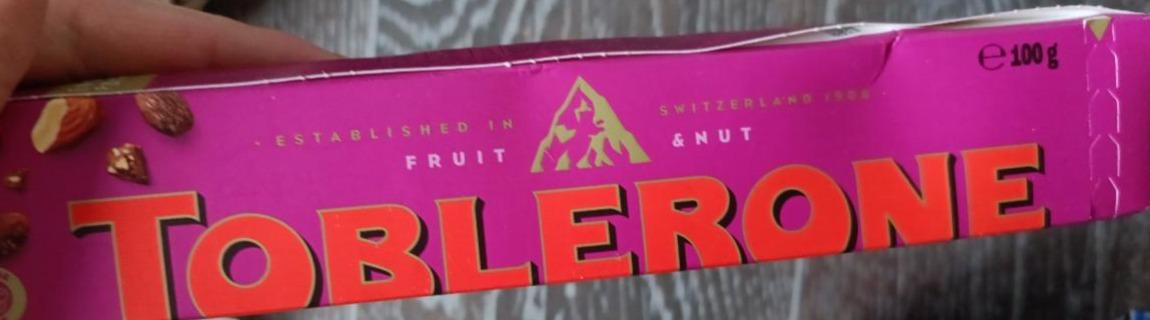 Фото - Шоколад Молочний з родзинками і нугою Toblerone