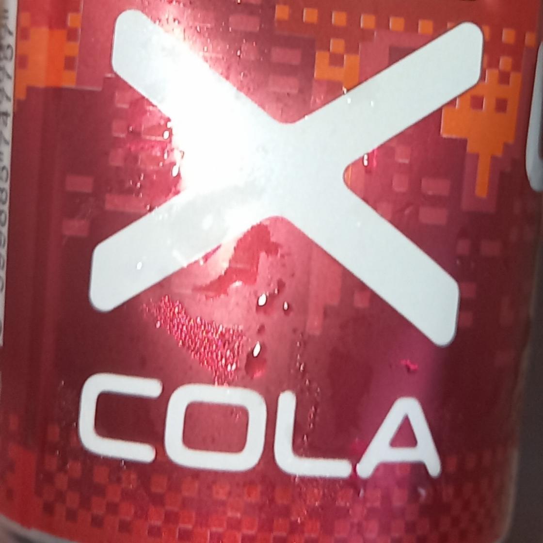 Фото - Напій безалкогольний газований Cola Xixo